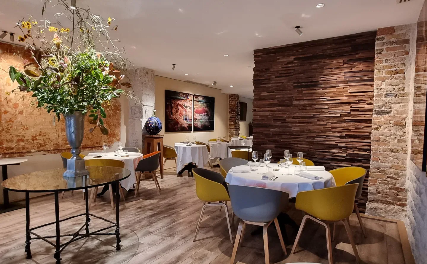 Interior dining at Jacques Faussat restaurant in Paris with a modern and cozy design