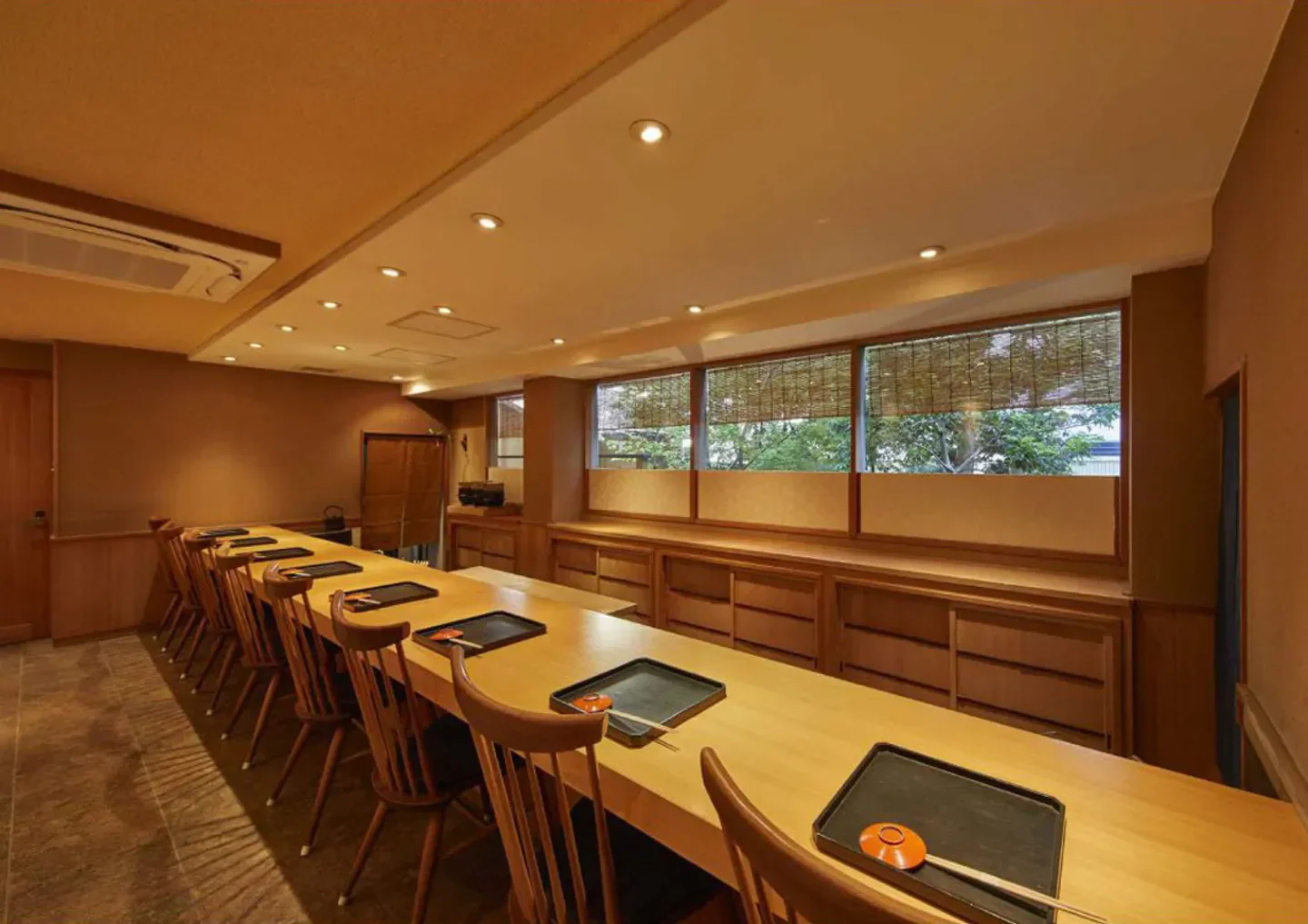 Interior of Jiki Miyazawa in Kyoto, with wooden counter and traditional design.