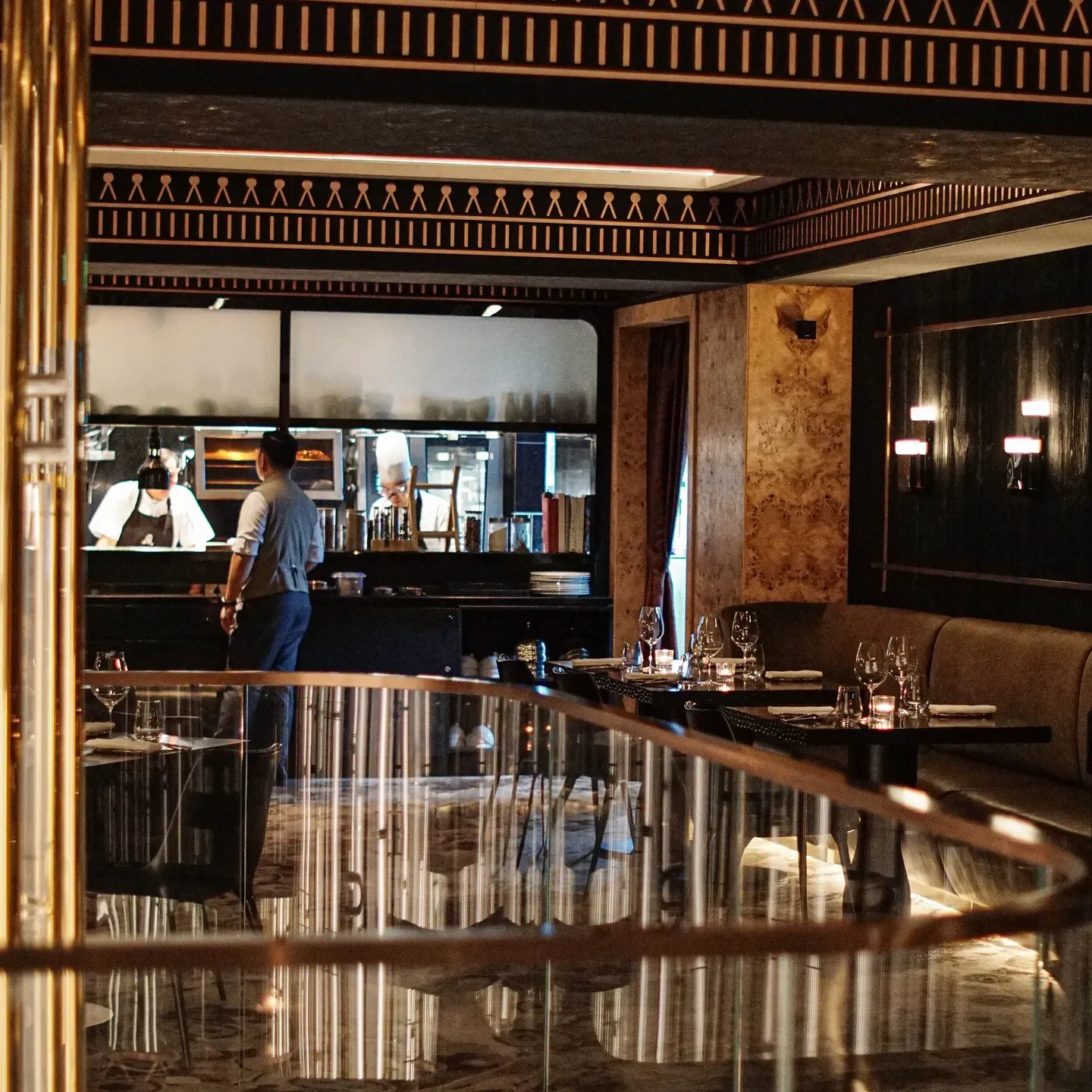 Interior view of J.J.A. restaurant in Jakarta, featuring chefs and elegant dining space