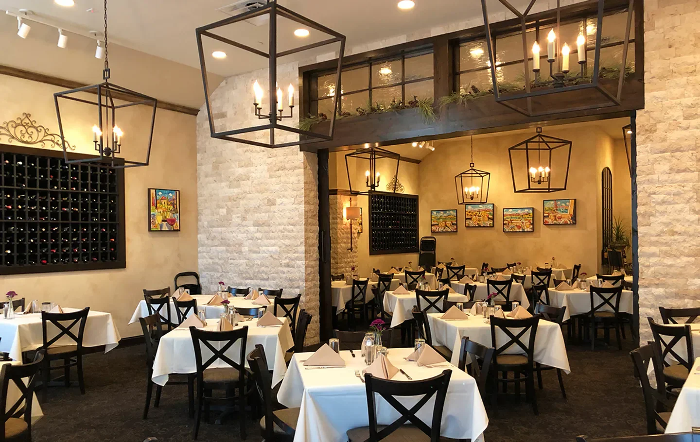 Interior of JJ's Restaurant in Kansas City, featuring elegant tables and ambiance