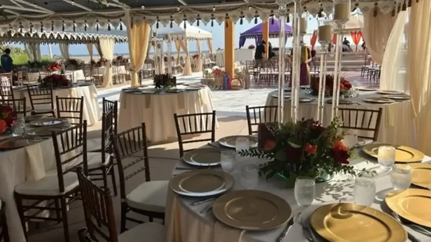 Elegant event setup at Jonathan Beach Club in Los Angeles, featuring ocean views.