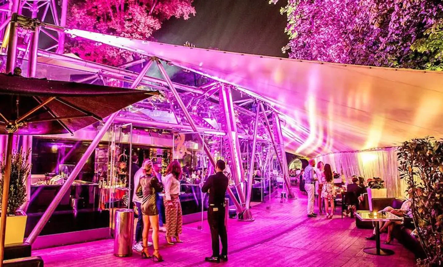 Just Cavalli in Milan, stylish restaurant interior with pink lighting and elegant ambiance