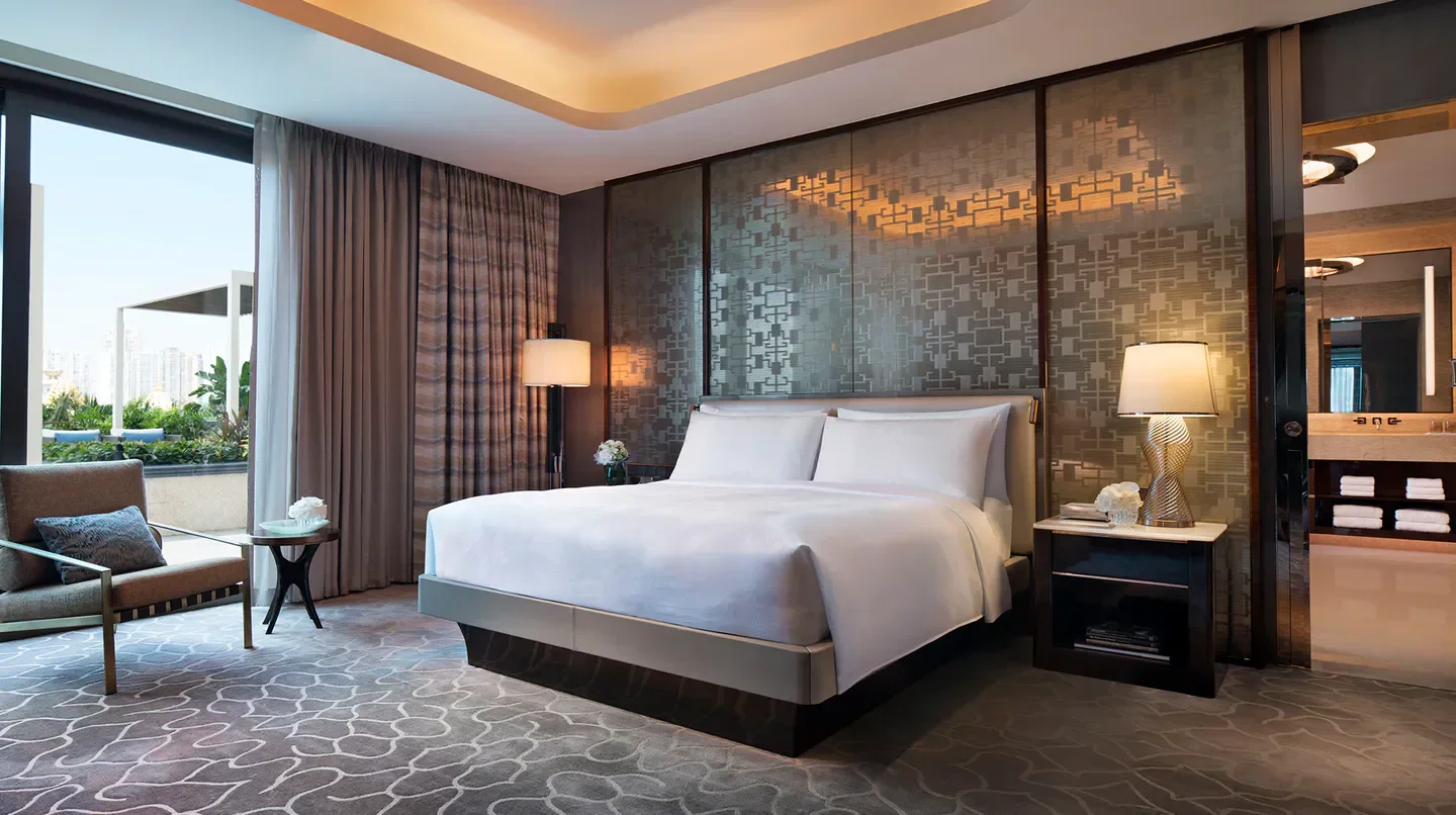 Luxury bedroom at JW Marriott Hotel Macau, featuring elegant design and city views