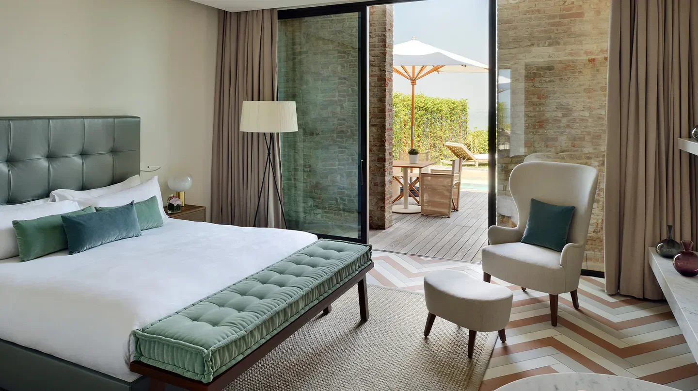 JW Marriott Venice Resort & Spa luxury hotel room with pool view in Venice, Italy.