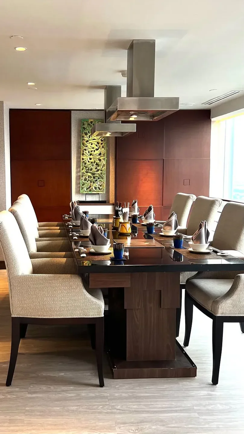 Elegant dining at Kahyangan Restaurant in Jakarta, featuring a sophisticated table setting.