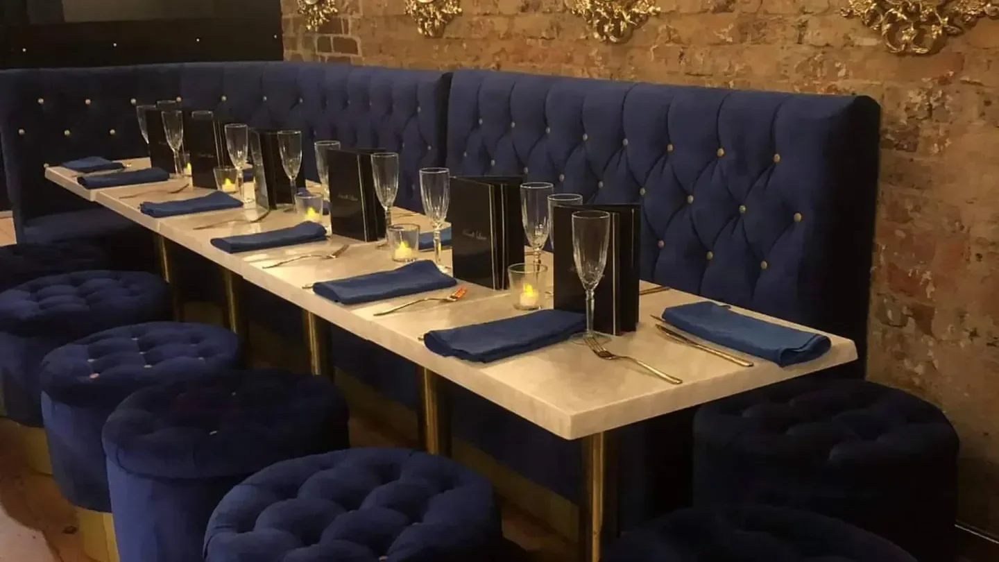 Elegant seating and table setting at Kandi Luxe nightclub in Sydney, ready for a night out.