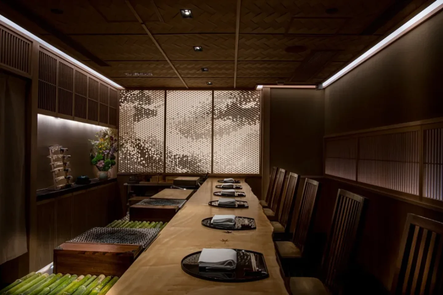 Interior of Kappo Rin in Hong Kong with a long wooden table, perfect for a fine dining experience.