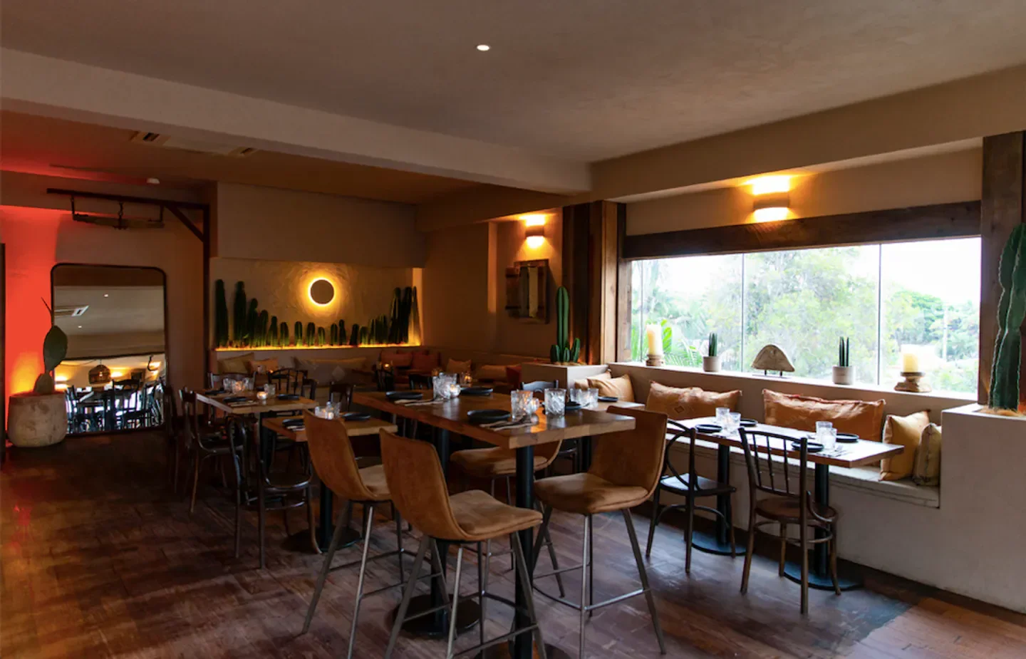 Interior of Karkalla restaurant in Byron Bay featuring stylish decor and dining tables.