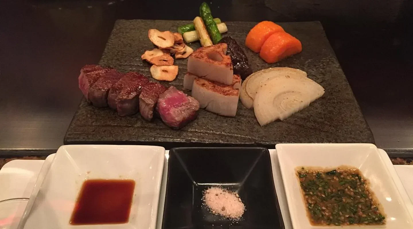 Delicious steak and side dishes at Kawamura restaurant in Tokyo.