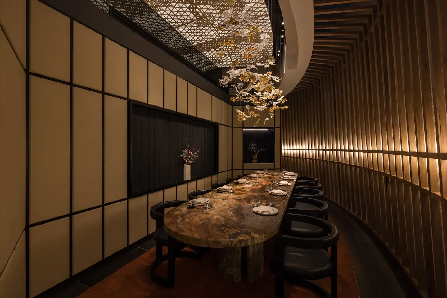 Elegant interior of Kazan Dining in Sydney, featuring a long dining table and decor.