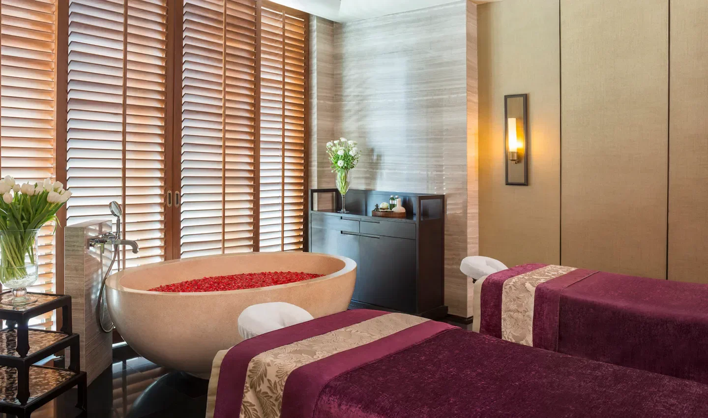 Relaxing spa interior at Kempinski The Spa at Siam Kempinski Hotel Bangkok, featuring soaking tub