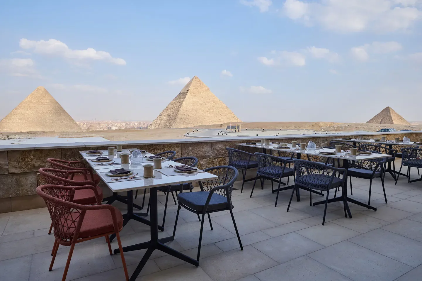 Restaurant patio at KHUFU'S in Cairo with stunning Great Pyramid view.