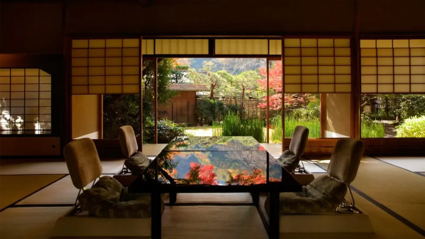Interior view of Kitcho Arashiyama Honten restaurant in Kyoto with beautiful garden view