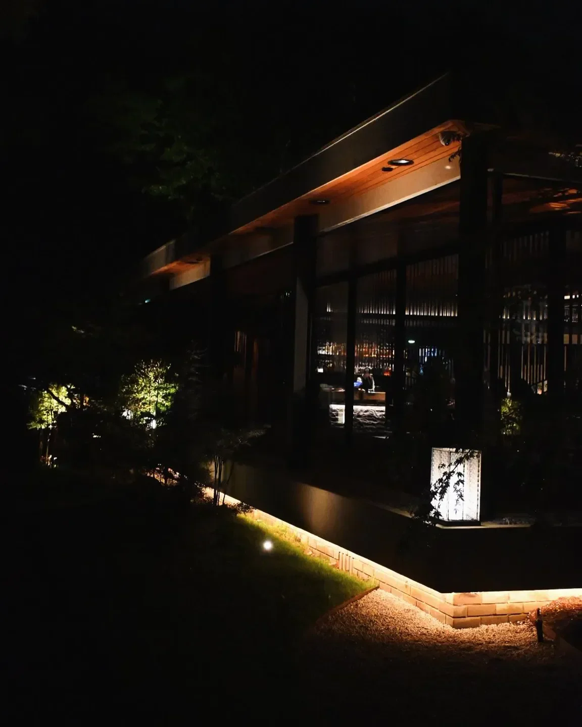 Night view of Koto Dining restaurant in Canberra, showcasing outdoor lighting