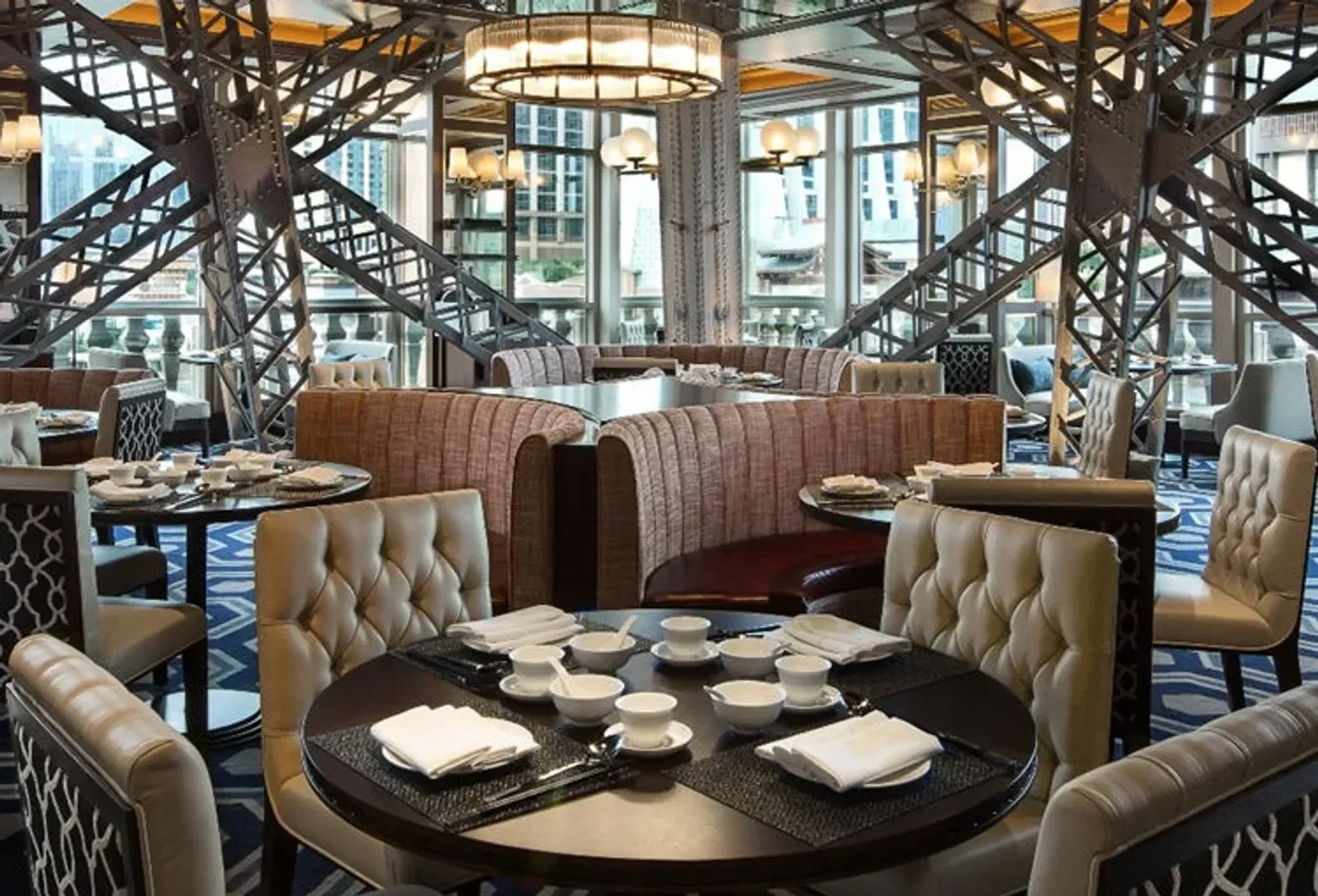 Elegant dining at La Chine restaurant in Macau with views and sophisticated decor.