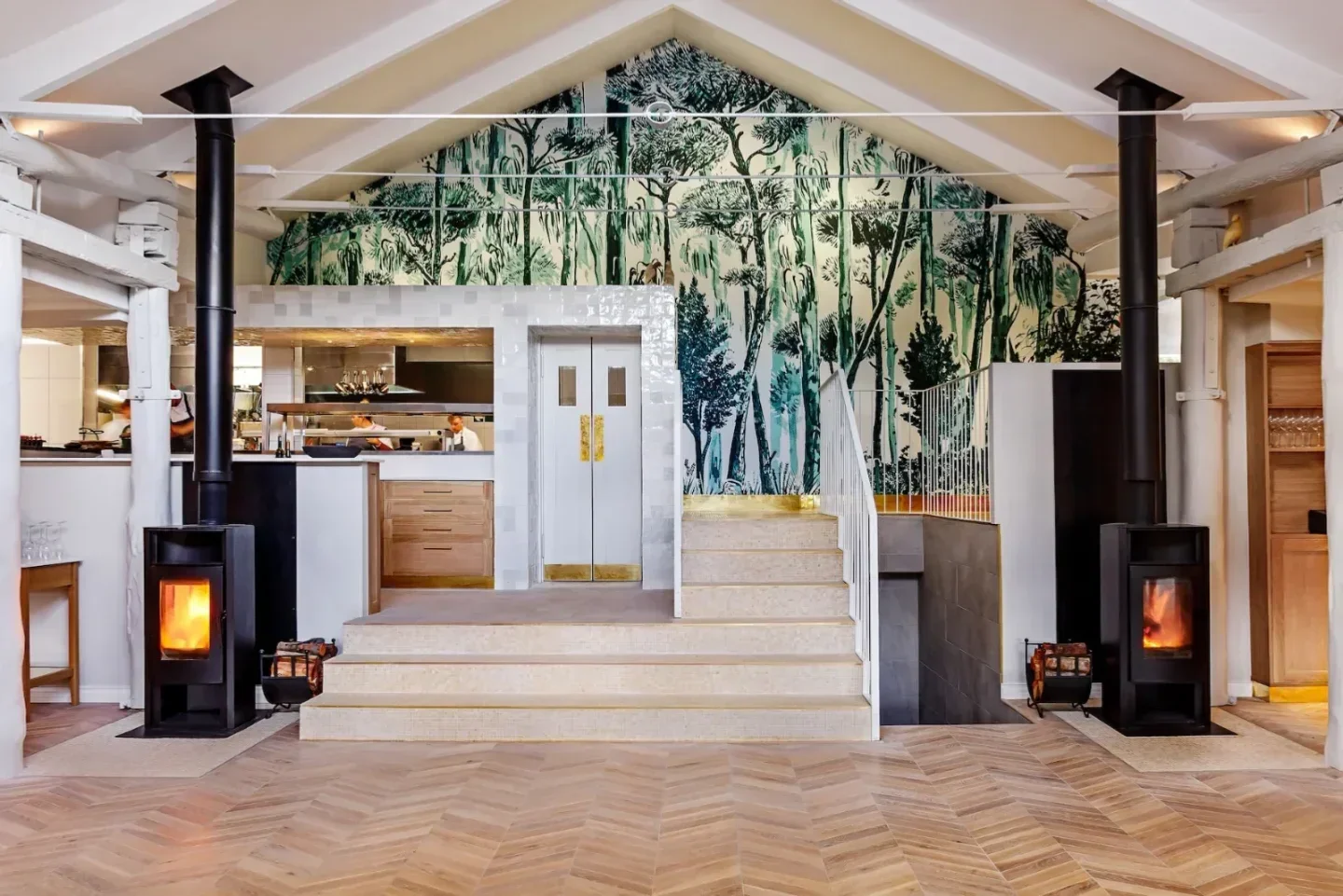 Interior of La Colombe restaurant in Cape Town with unique design and fireplace
