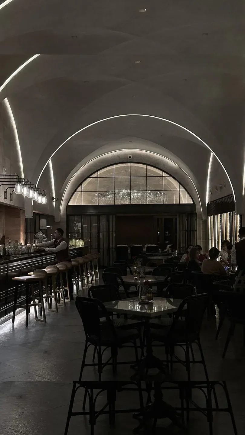 Interior of La Piazza restaurant in Manila, featuring bar and dining area.