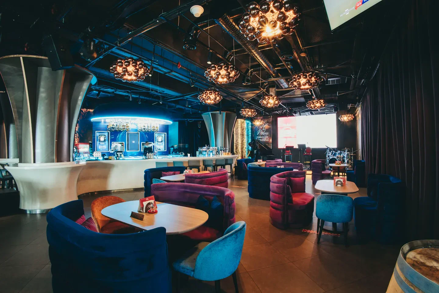 Stylish interior of LAVO restaurant in Kuala Lumpur with modern lighting and seating.