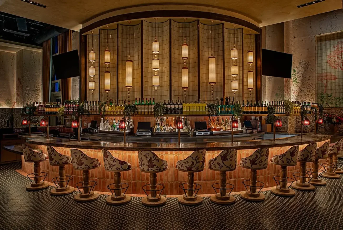 Stylish bar at LAVO Restaurant in Las Vegas with unique patterned chairs and lighting.