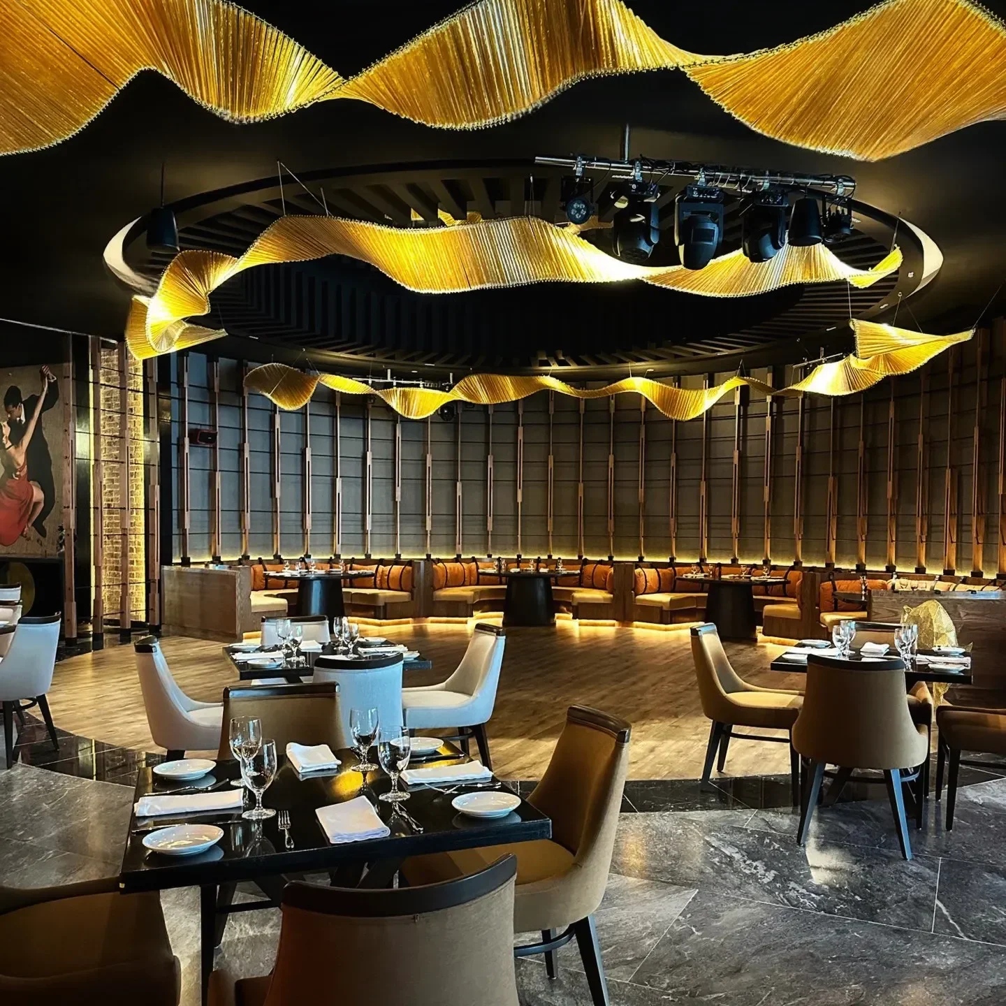 Elegant interior of Le Basilic restaurant in Cancun, featuring stylish decor and ambient lighting.