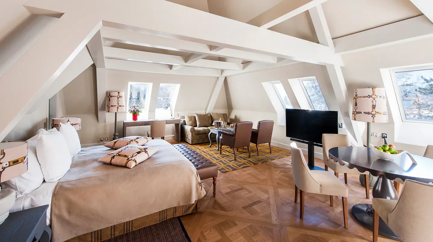 Luxury hotel suite at Le Grand Bellevue, St. Moritz, featuring a stylish living space.
