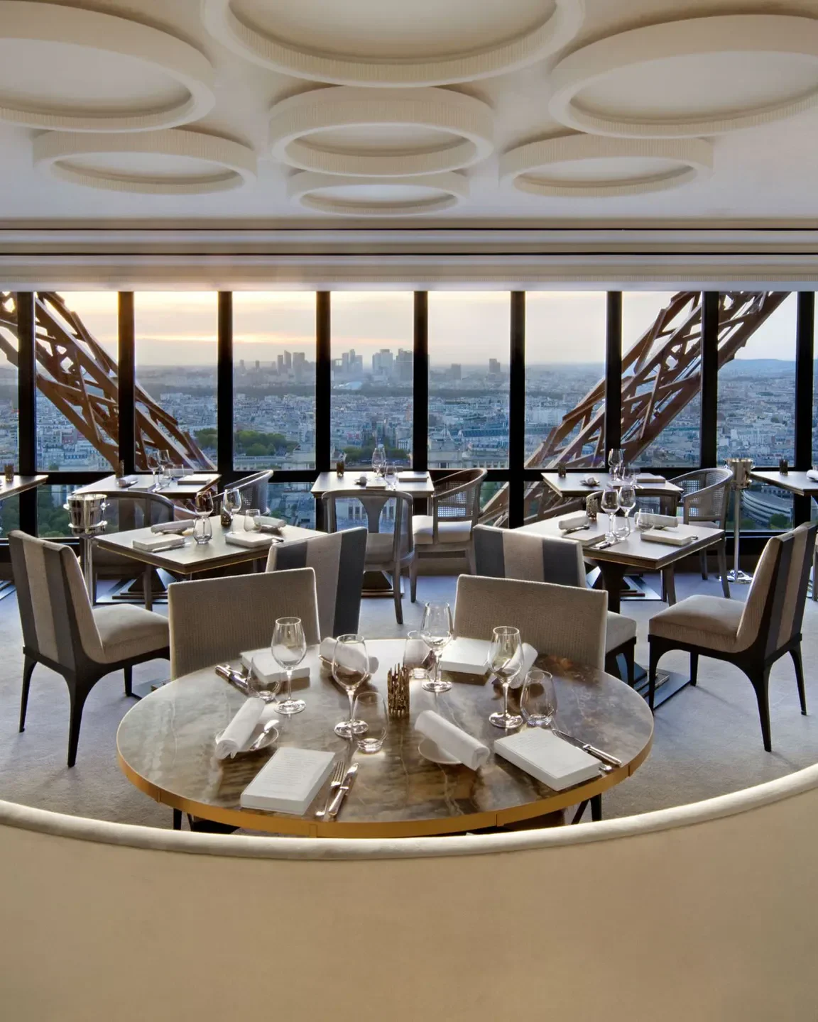 Elegant dining room at Le Jules Verne, Paris, with Eiffel Tower view