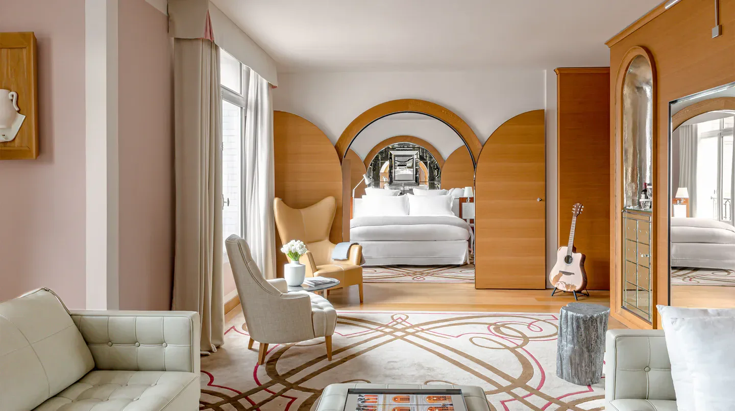 Elegant bedroom at Le Royal Monceau - Raffles Paris, showcasing Parisian luxury.