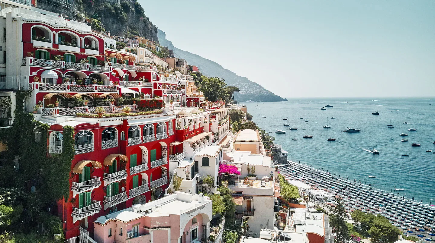 Le Sirenuse hotel in Napoli overlooking the Mediterranean Sea and beach.
