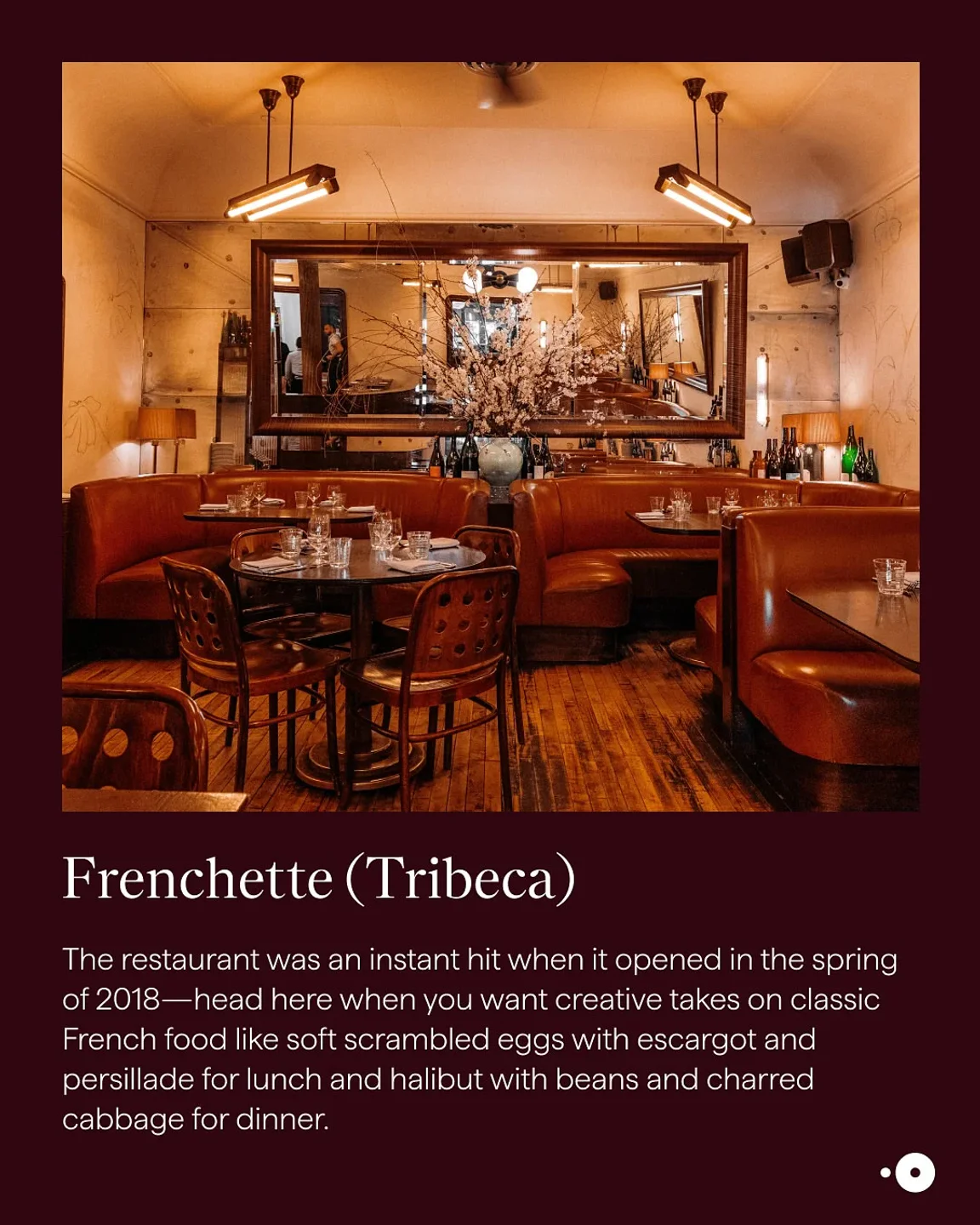 Warm and inviting interior of Le Veau d'Or restaurant in the city with plush booth seating and elegant decor.