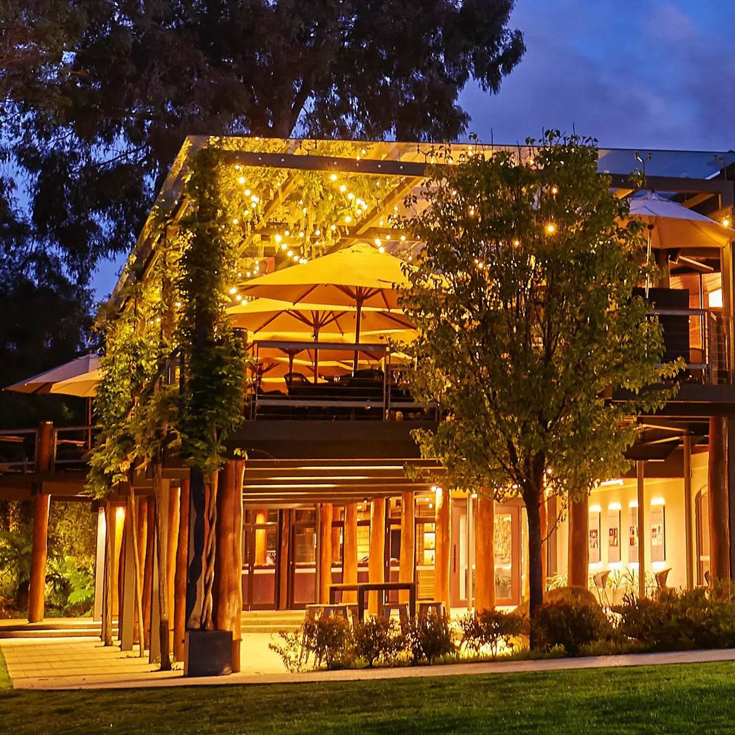 Leeuwin Estate Restaurant in Margaret River at night, outdoor seating with ambient lights