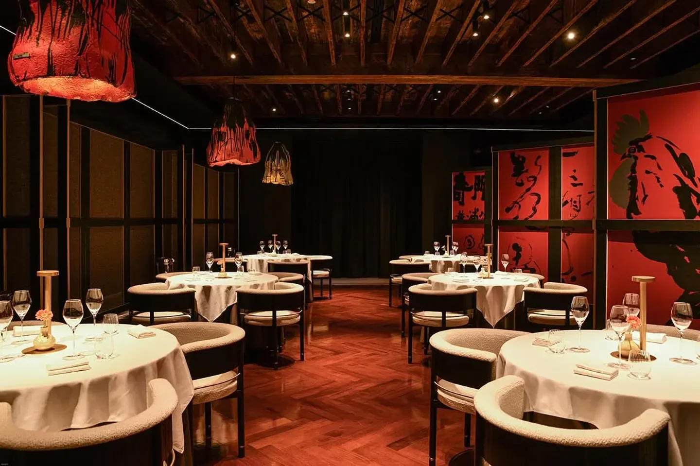 Elegant dining room interior at Ling Long - Shanghai, with round tables and artwork.