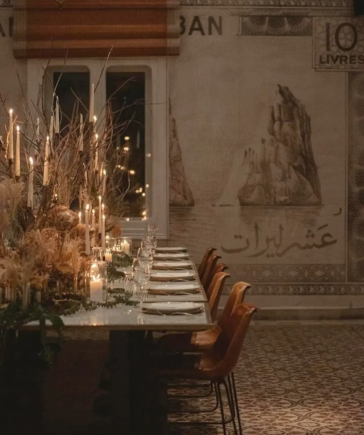Cozy dining setting at Liza Beirut in Beirut, with candles and elegant decor.