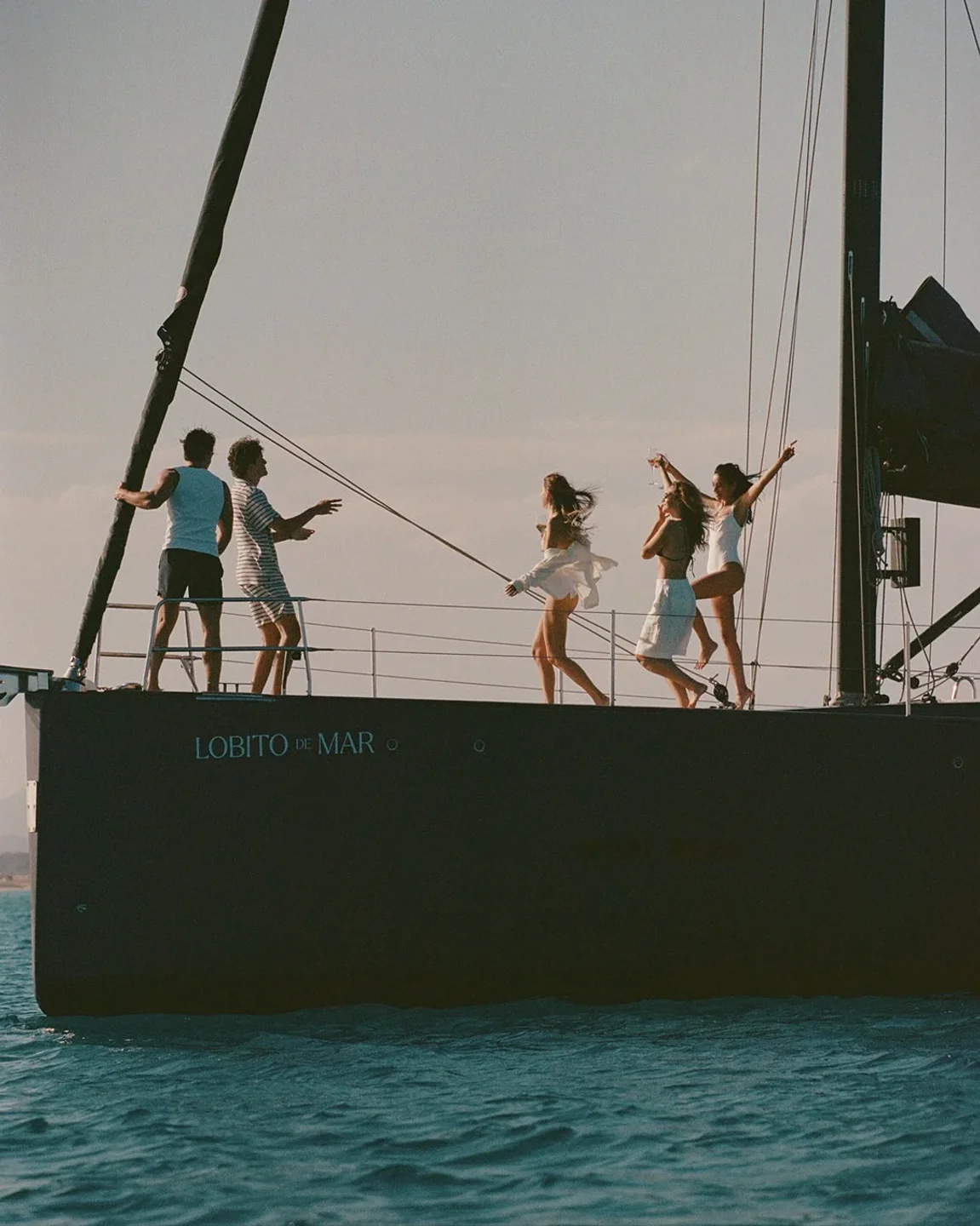 Lobito de Mar yacht sailing near Ibiza with friends enjoying the sun and sea.