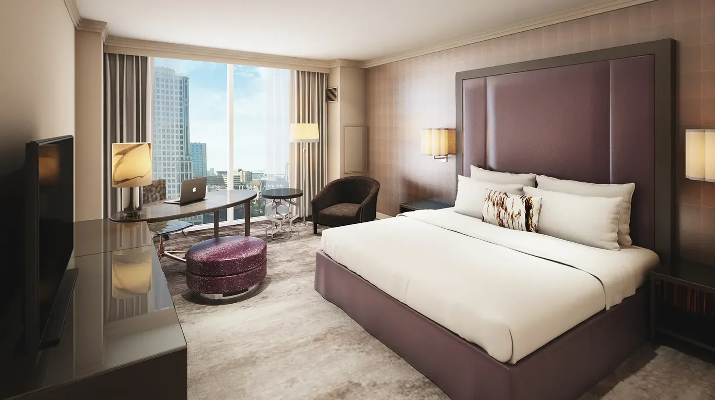 Spacious guest room at Loews Atlanta Hotel with city views in Atlanta.