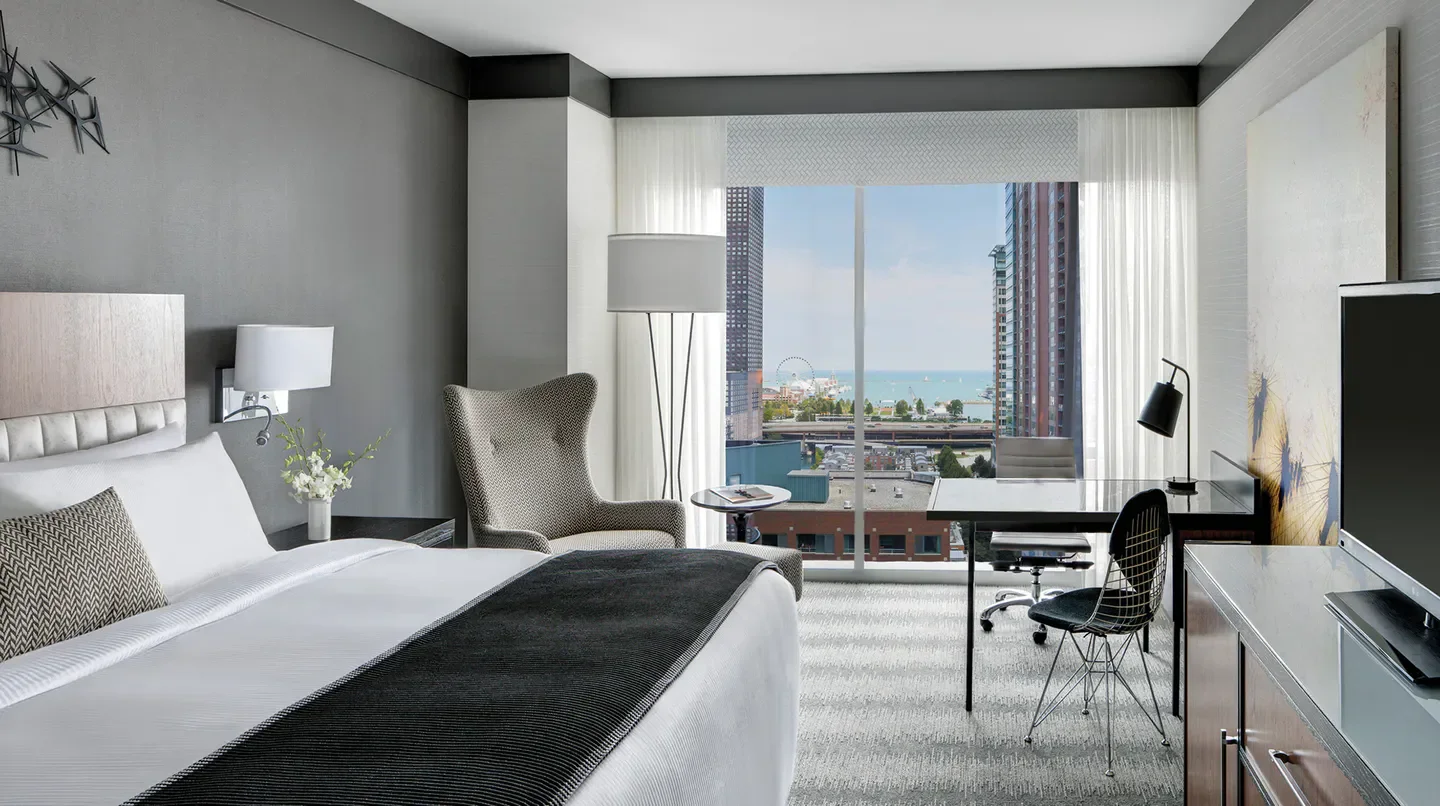 Loews Chicago Hotel guest room with city and lake views in Chicago