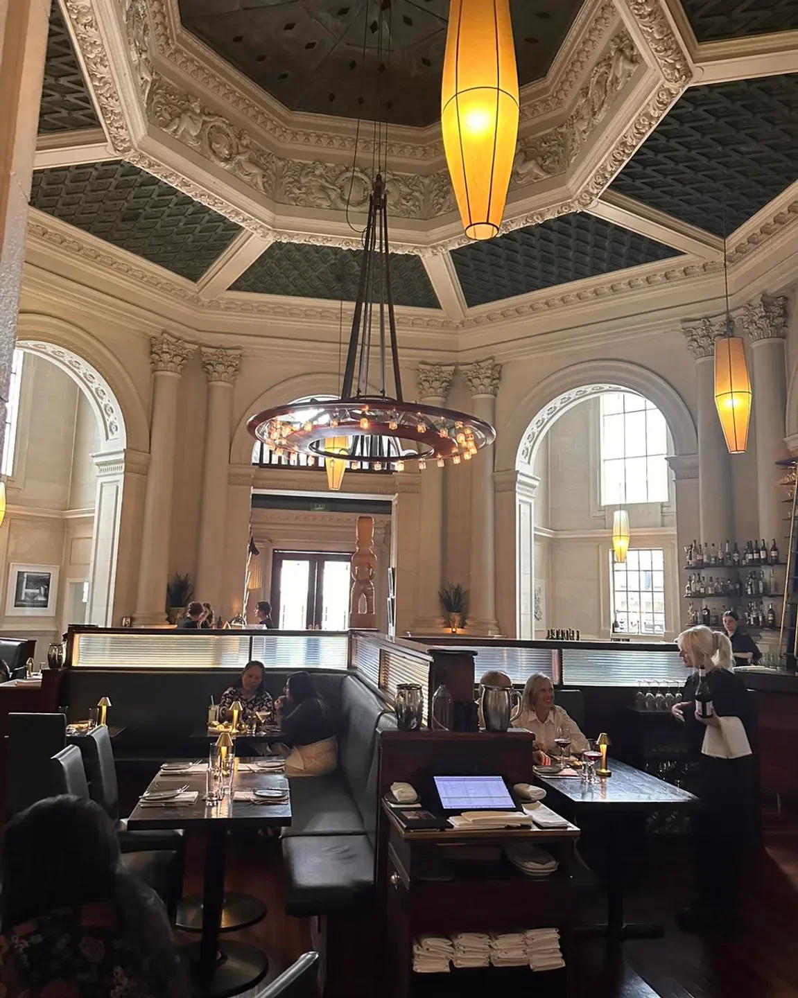 Elegant dining room interior at Logan Brown Restaurant in Wellington with ornate ceiling.