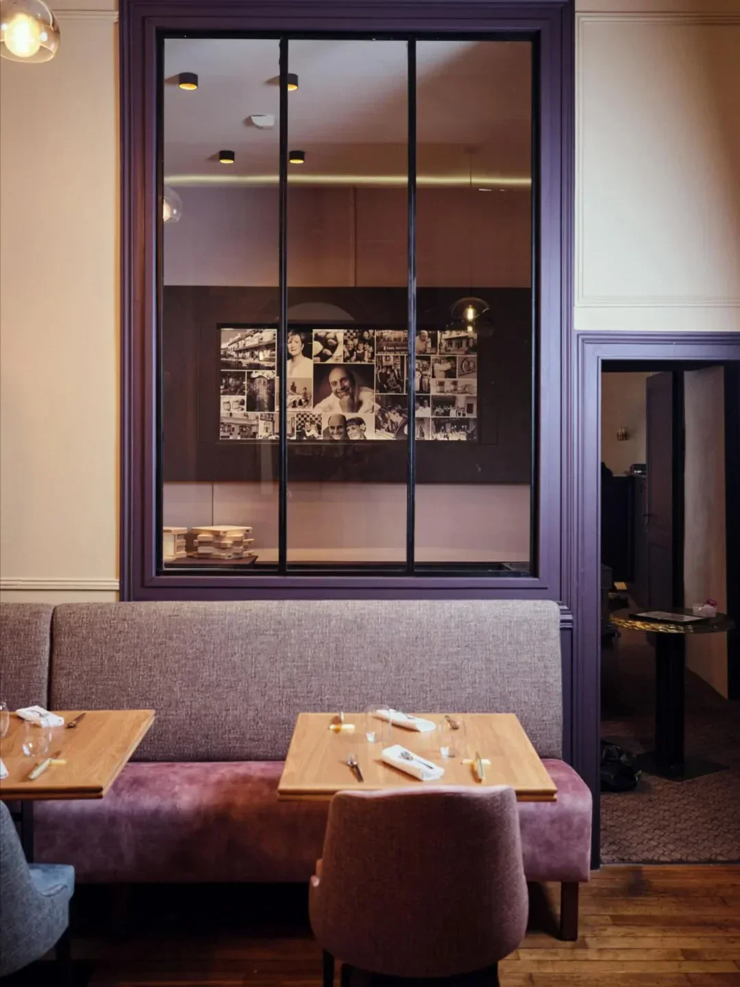 Interior of Loiseau des Ducs restaurant in Bourgogne, showing tables and decorative elements