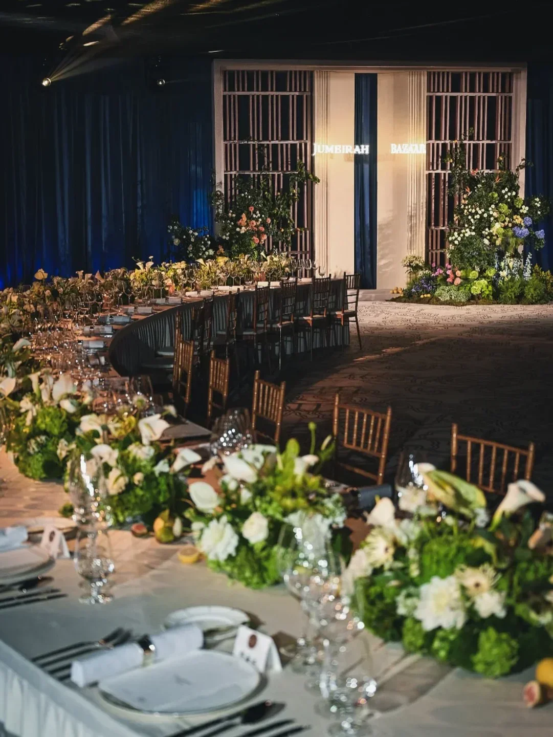Elegant dining at L'Olivo restaurant in Capri, Italy, with floral centerpieces and decor.