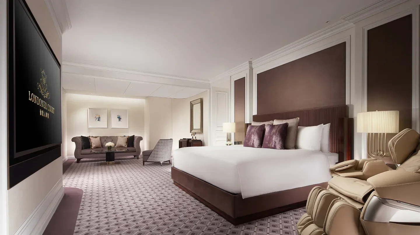 Luxury hotel room interior at Londoner Court in Macau, featuring a large bed.