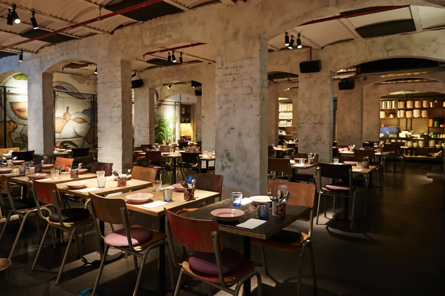 Interior of Long Chim Perth restaurant in Perth, with tables and chairs.