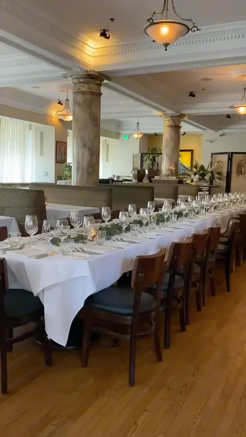 Elegant dining room at L'Opera Italian Restaurant in Orange County, ready for guests