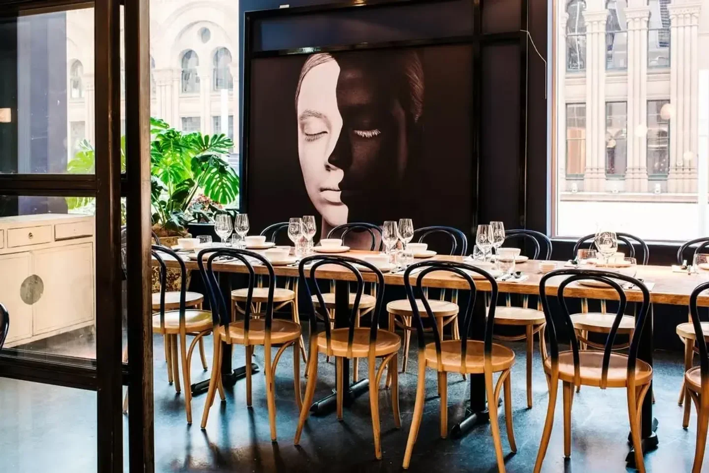 Lotus The Galeries restaurant interior in Sydney, with elegant dining table and art