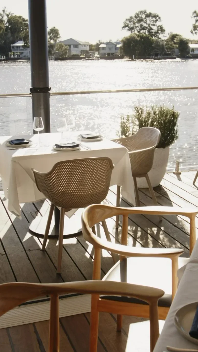 Outdoor dining area at Lucio's Marina on the Sunshine Coast, overlooking the water
