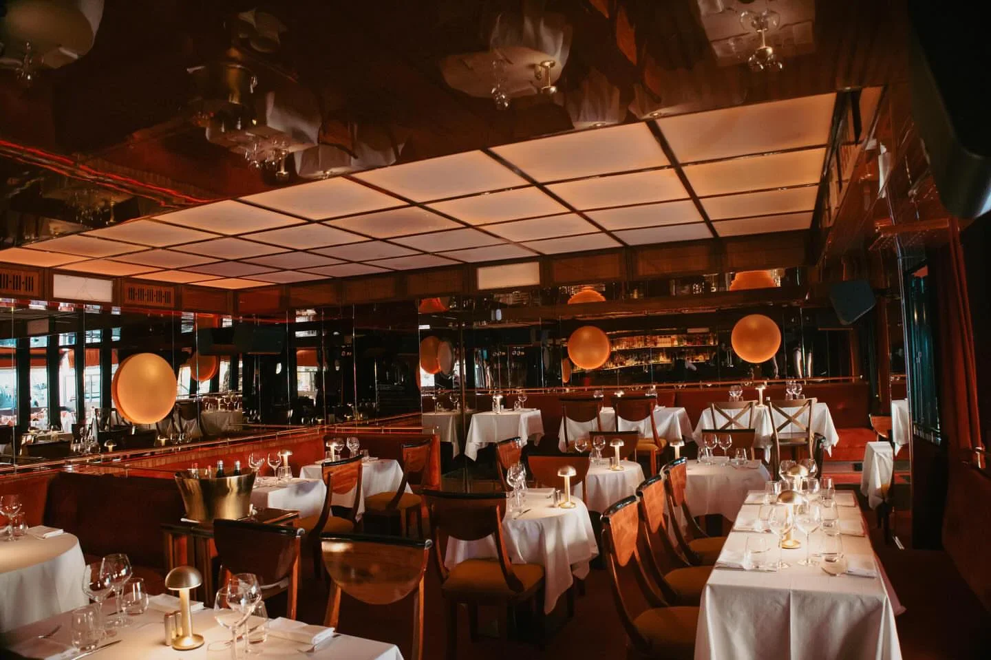 Interior of Luigi restaurant in Cannes, France, featuring elegant dining tables and ambient lighting, a perfect dining experience.