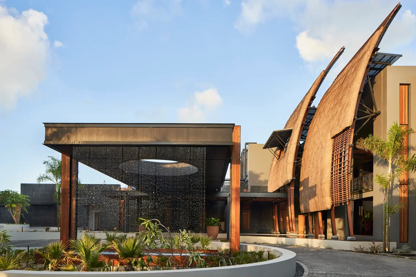 Exterior of LUX* ME Spa at Grand Baie in Mauritius, featuring a modern design and water feature.