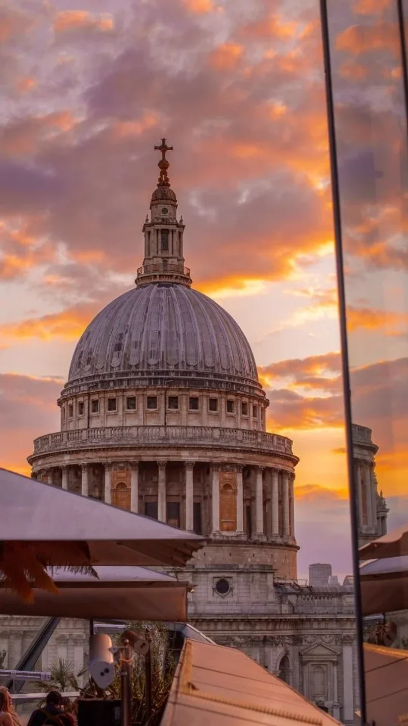 St Paul's Cathedral dome views from Madison rooftops in London at sunset