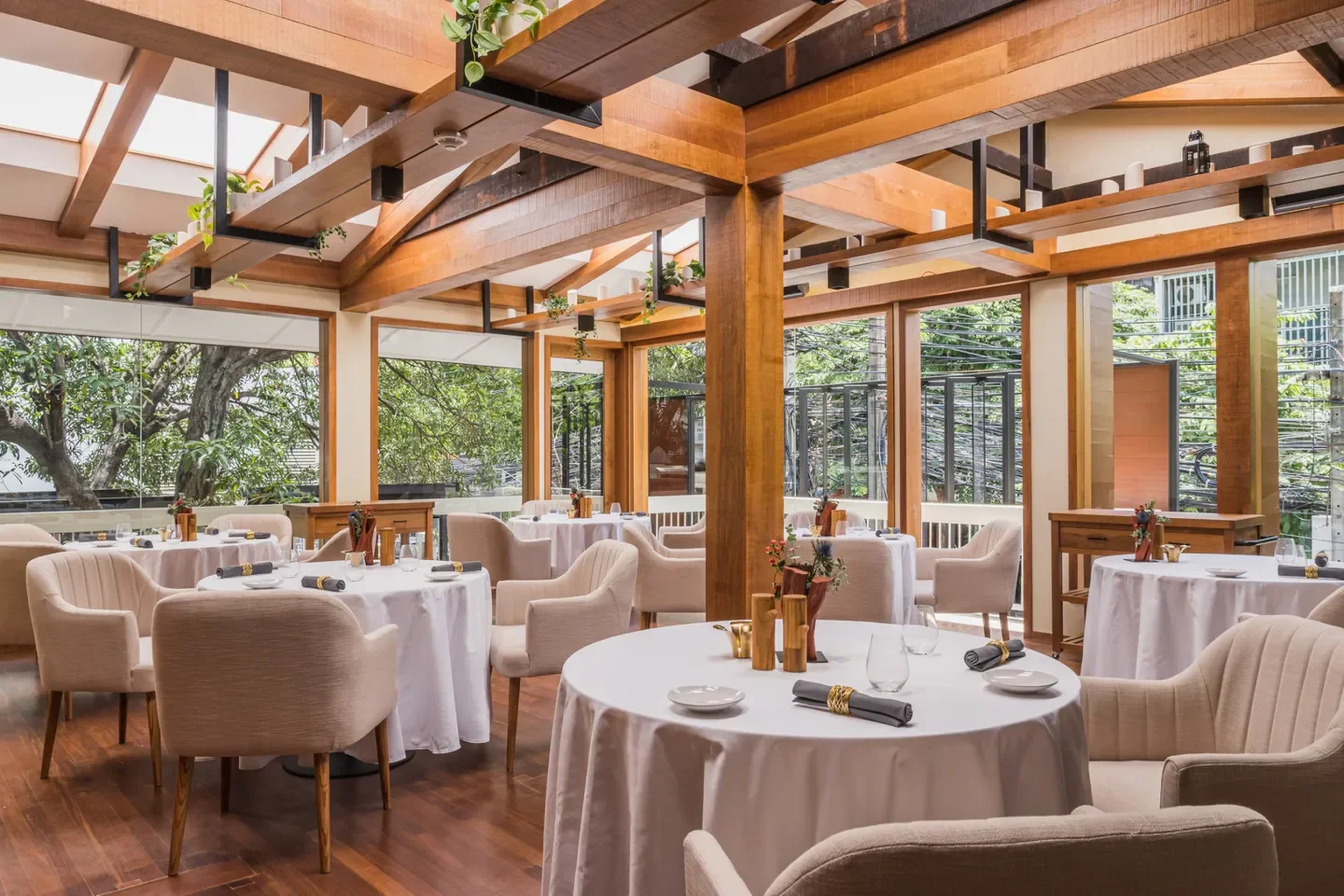 Elegant dining room interior at Maison Dunand in Bangkok, Thailand