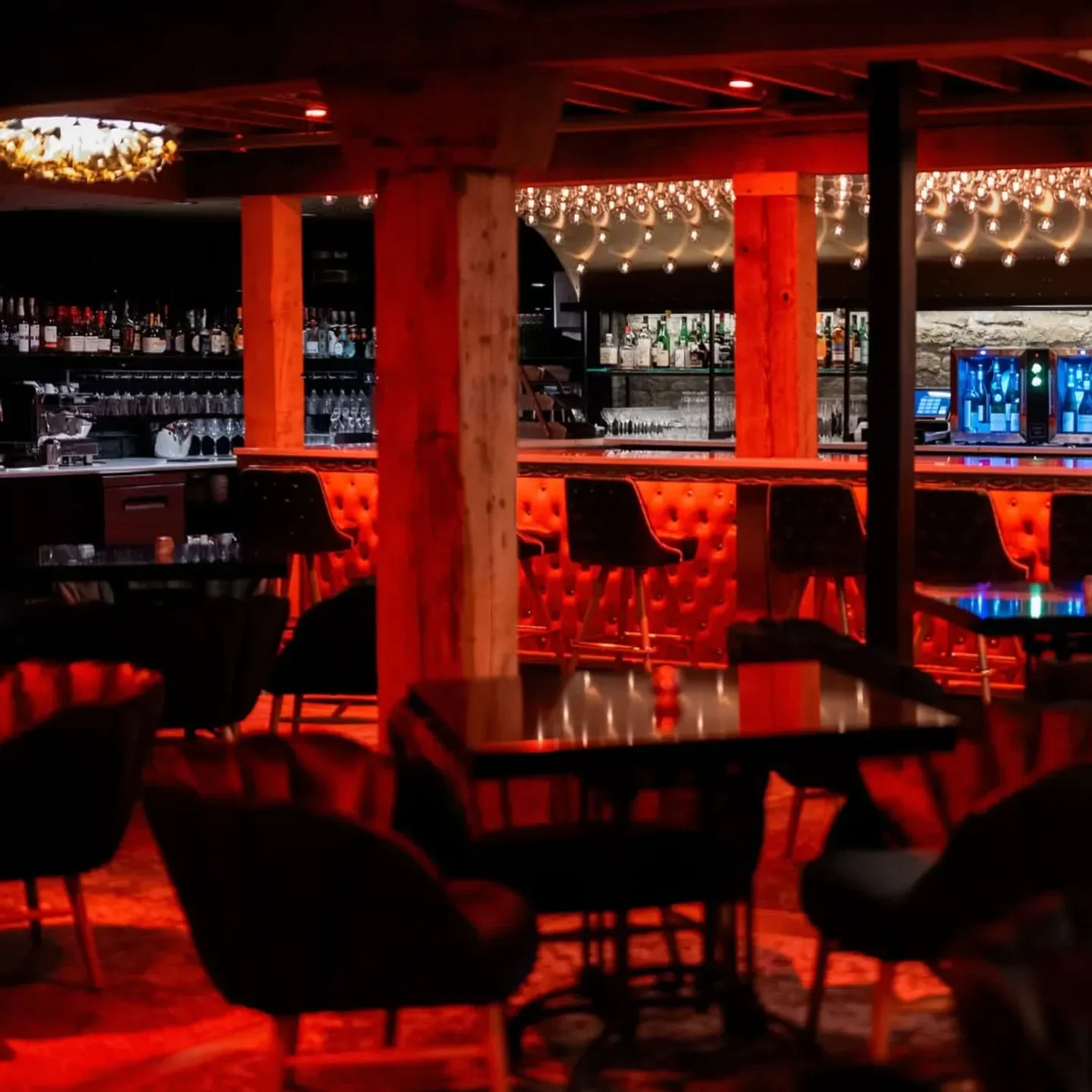 Interior of Maison Margaux in Minneapolis, featuring a stylish bar and seating.