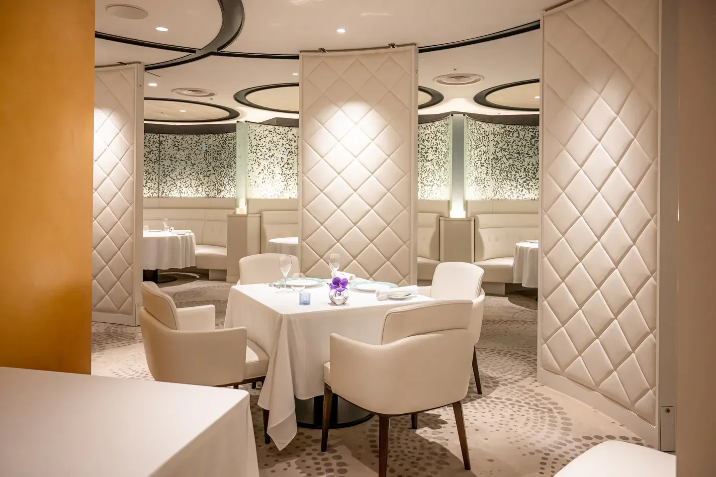 Elegant dining room at Maison Tateru Yoshino in Osaka, featuring stylish decor and seating.