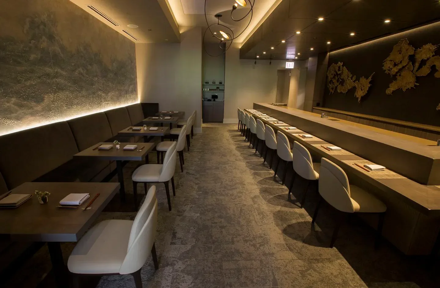 Interior dining at Mako in Chicago, with elegant seating and artistic decor.